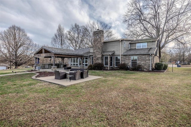 rear view of property featuring an outdoor living space, a chimney, a patio, a lawn, and brick siding