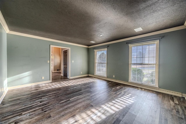 unfurnished room featuring dark wood-type flooring, a textured ceiling, baseboards, and ornamental molding