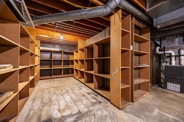 unfinished basement with heating unit