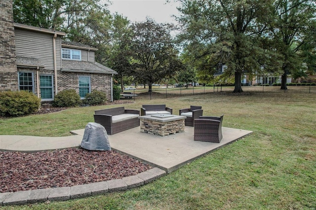 view of patio featuring a fire pit
