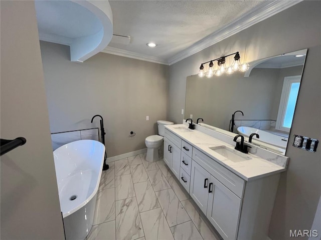 bathroom featuring marble look tiles, double vanity, ornamental molding, a soaking tub, and toilet