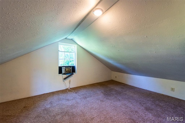 290 E Oak St, Saint Clair, MO 63077 - additional living space featuring carpet flooring, a textured ceiling, lofted ceiling, and cooling unit