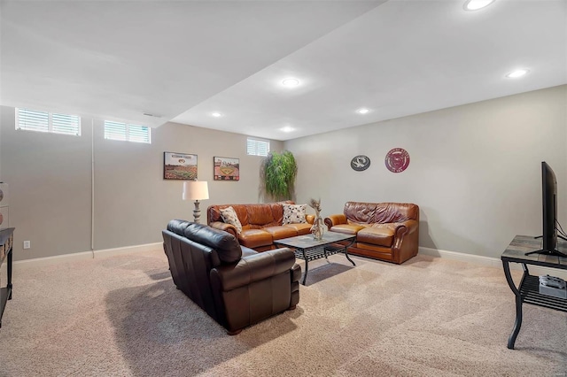 living room featuring light carpet, baseboards, and recessed lighting