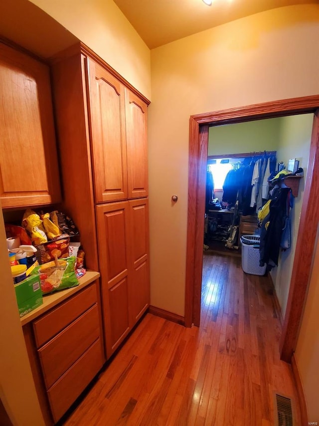 104 E Bryan St, Ewing, MO 63440 - corridor with hardwood / wood-style flooring and baseboards