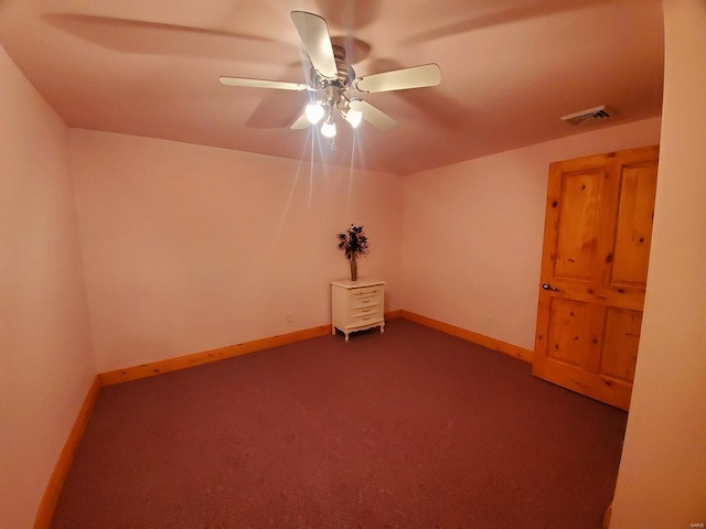 104 E Bryan St, Ewing, MO 63440 - unfurnished room featuring ceiling fan, dark carpet, and baseboards