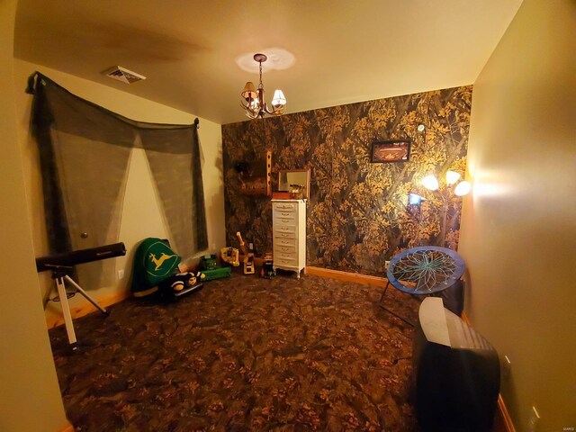 104 E Bryan St, Ewing, MO 63440 - bedroom featuring a chandelier and baseboards