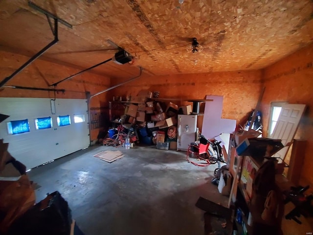104 E Bryan St, Ewing, MO 63440 - garage featuring a garage door opener