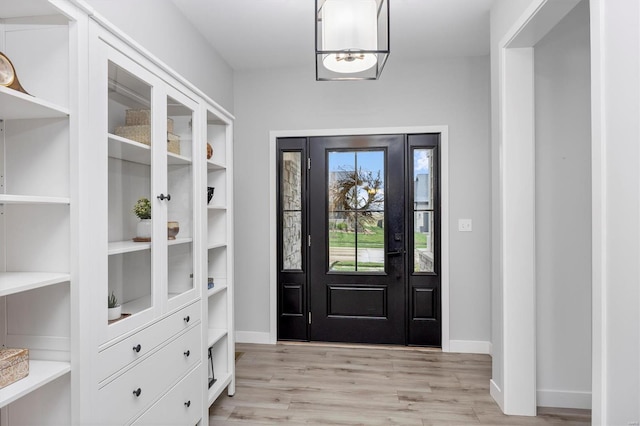 7121 Lost Oak Dr, Edwardsville, IL 62025 - entrance foyer featuring light wood-style flooring and baseboards