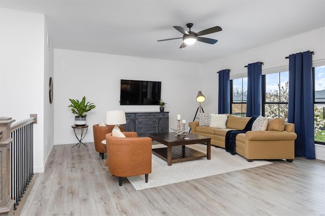 7121 Lost Oak Dr, Edwardsville, IL 62025 - living room featuring ceiling fan, wood finished floors, and baseboards