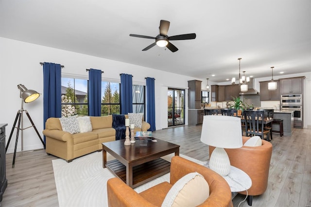 7121 Lost Oak Dr, Edwardsville, IL 62025 - living area with a ceiling fan, light wood-type flooring, recessed lighting, and baseboards