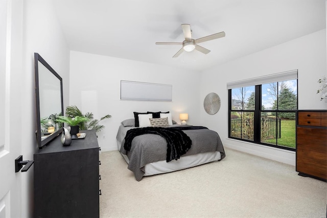7121 Lost Oak Dr, Edwardsville, IL 62025 - carpeted bedroom featuring baseboards and a ceiling fan