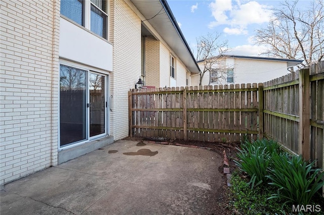 10469 Briarbend Dr Unit 4, Saint Louis, MO 63146 - view of patio featuring a fenced backyard