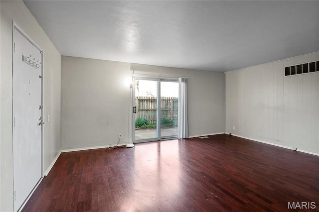 10469 Briarbend Dr Unit 4, Saint Louis, MO 63146 - spare room with wood finished floors and baseboards