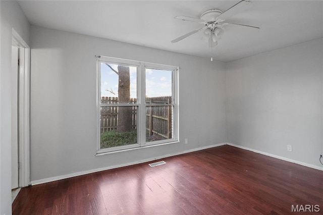 10469 Briarbend Dr Unit 4, Saint Louis, MO 63146 - empty room with wood finished floors, baseboards, and a ceiling fan