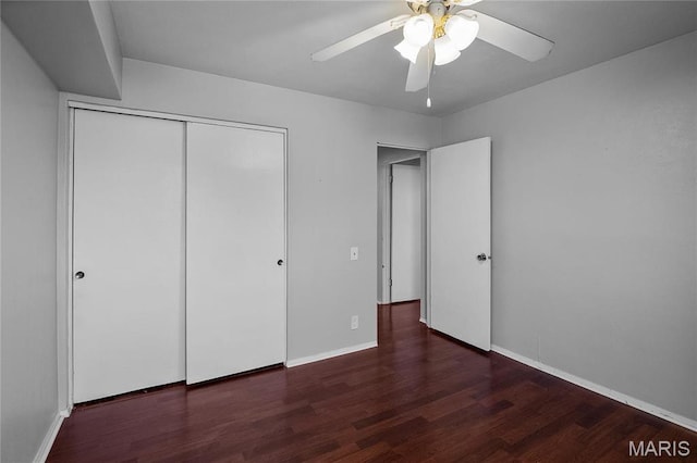 10469 Briarbend Dr Unit 4, Saint Louis, MO 63146 - unfurnished bedroom with wood finished floors, a closet, and baseboards