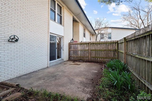 10469 Briarbend Dr Unit 4, Saint Louis, MO 63146 - view of patio / terrace with a fenced backyard