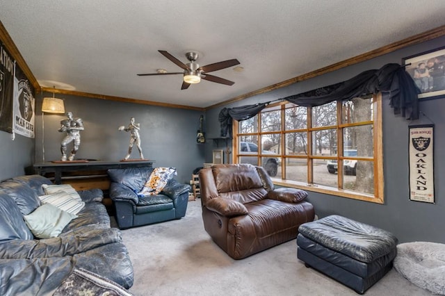 living room with carpet, ceiling fan, crown molding, and a textured ceiling