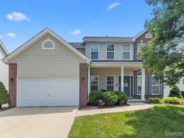 6804 Laurel Springs Ct, Fairview Heights, IL 62208 - view of front facade featuring brick siding, concrete driveway, covered porch, and an attached garage