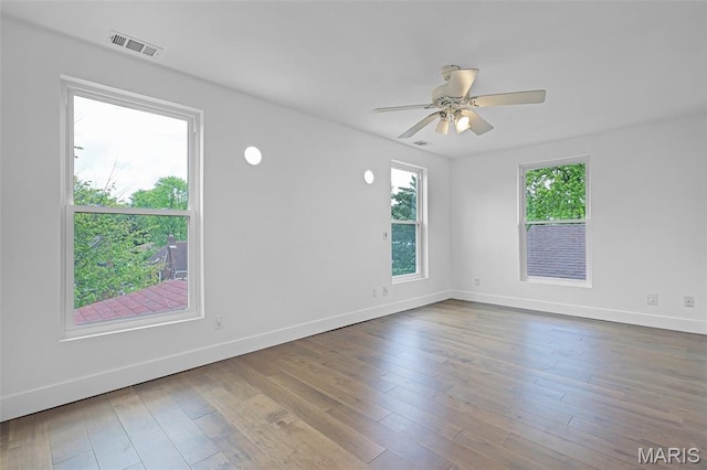 1521 Collins Ave, Saint Louis, MO 63117 - empty room with baseboards, ceiling fan, and wood finished floors