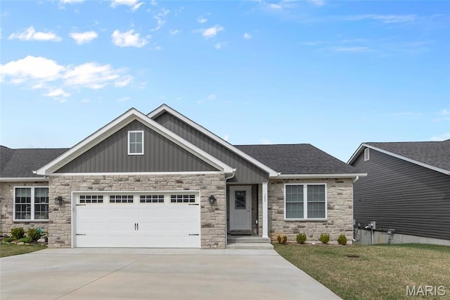 1542 Hickory Lndg, De Soto, MO 63020 - craftsman inspired home with board and batten siding, stone siding, a garage, driveway, and a shingled roof