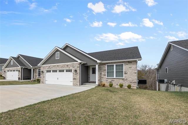 1542 Hickory Lndg, De Soto, MO 63020 - view of front of property with stone siding, driveway, an attached garage, a front lawn, and board and batten siding