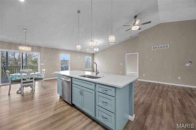 1542 Hickory Lndg, De Soto, MO 63020 - kitchen featuring a sink, dishwasher, lofted ceiling, light countertops, and light wood-style floors