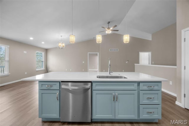 1542 Hickory Lndg, De Soto, MO 63020 - kitchen with dishwasher, a sink, a ceiling fan, open floor plan, and light countertops