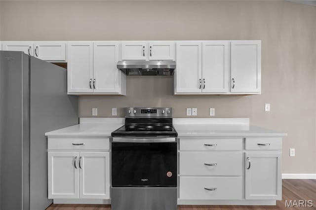 1542 Hickory Lndg, De Soto, MO 63020 - kitchen featuring range hood, appliances with stainless steel finishes, light countertops, and white cabinets