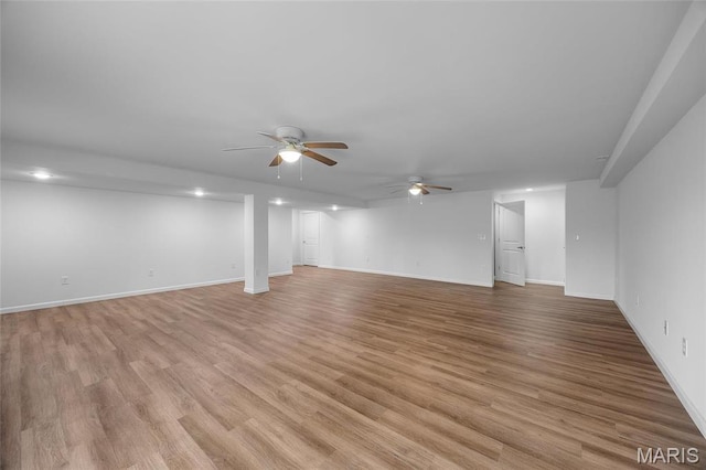 1542 Hickory Lndg, De Soto, MO 63020 - basement with ceiling fan, light wood-type flooring, and baseboards