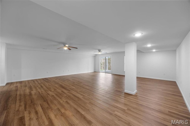 1542 Hickory Lndg, De Soto, MO 63020 - unfurnished living room with a ceiling fan, baseboards, light wood-type flooring, and recessed lighting