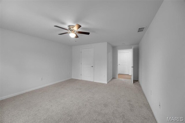 1542 Hickory Lndg, De Soto, MO 63020 - unfurnished bedroom featuring baseboards, light colored carpet, and ceiling fan