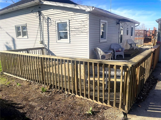 106 S 3rd, Novelty, MO 63460 - rear view of house featuring a wooden deck