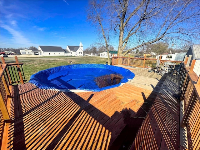106 S 3rd, Novelty, MO 63460 - view of pool with a wooden deck, a covered pool, a yard, an outdoor structure, and a shed
