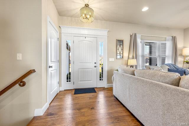 620 Lubbuck Ct, Moscow Mills, MO 63362 - foyer entrance with wood finished floors, baseboards, and recessed lighting