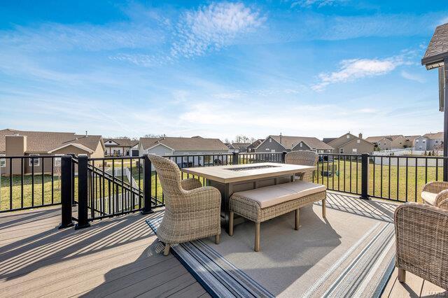 620 Lubbuck Ct, Moscow Mills, MO 63362 - deck with a residential view and a lawn