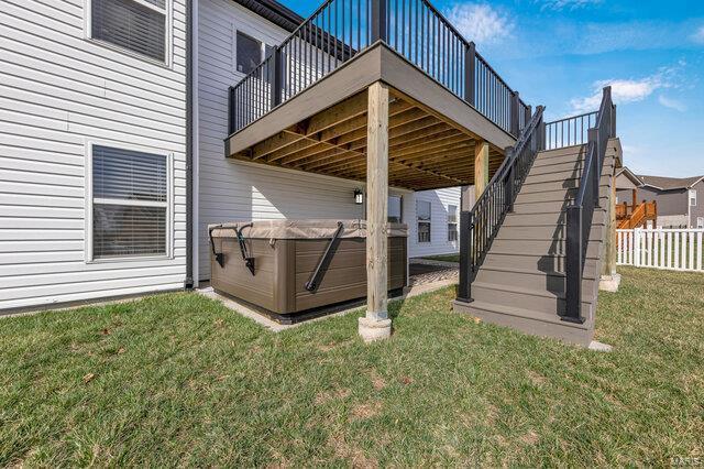620 Lubbuck Ct, Moscow Mills, MO 63362 - back of property with stairway and a wooden deck