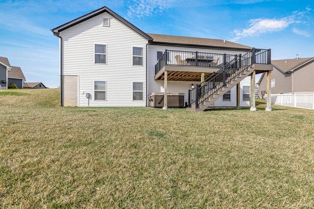 620 Lubbuck Ct, Moscow Mills, MO 63362 - rear view of property with stairway and a deck