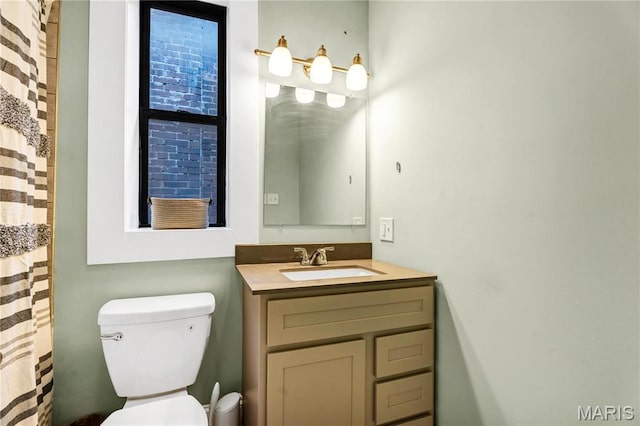 4716 Olive St, Saint Louis, MO 63108 - full bath featuring toilet and vanity