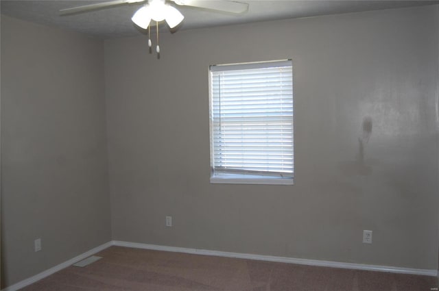 5711 Cedar Valley Dr, Poplar Bluff, MO 63901 - unfurnished room featuring a ceiling fan, carpet, healthy amount of natural light, and baseboards