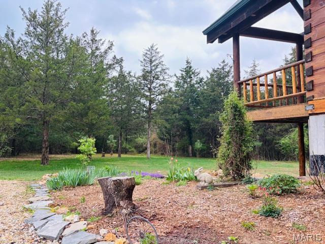 19125 County Road 1220, St James, MO 65559 - view of grassy yard featuring a wooden deck