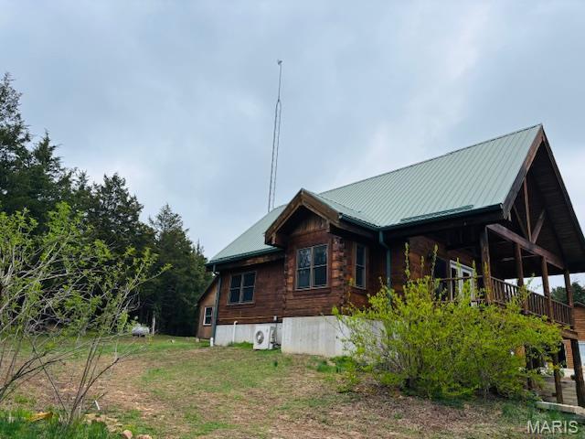 19125 County Road 1220, St James, MO 65559 - view of home's exterior featuring metal roof