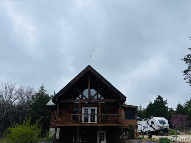 19125 County Road 1220, St James, MO 65559 - rear view of house with a deck and french doors