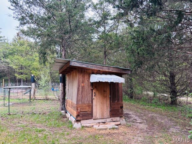 19125 County Road 1220, St James, MO 65559 - view of outbuilding featuring fence and an outbuilding