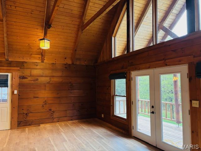 19125 County Road 1220, St James, MO 65559 - doorway featuring french doors, wood ceiling, beam ceiling, light wood finished floors, and healthy amount of natural light