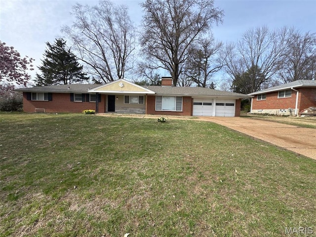 2355 Redman Rd, Saint Louis, MO 63136 - ranch-style home featuring an attached garage, brick siding, concrete driveway, and a chimney