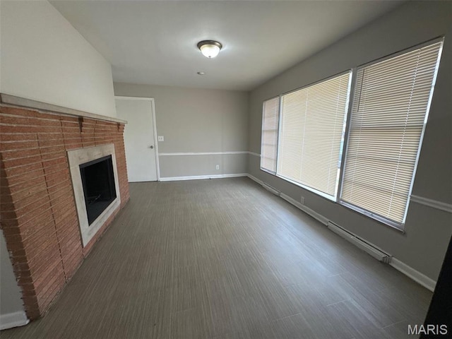 2355 Redman Rd, Saint Louis, MO 63136 - unfurnished living room with baseboards and a fireplace
