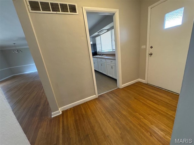 2355 Redman Rd, Saint Louis, MO 63136 - entrance foyer with wood finished floors and baseboards