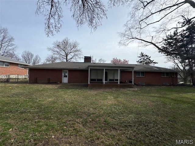 2355 Redman Rd, Saint Louis, MO 63136 - rear view of house with brick siding and a chimney