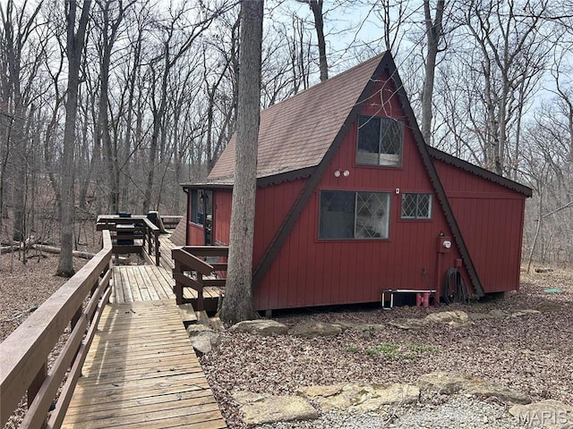 628 W St Gallen Dr, Innsbrook, MO 63390 - view of side of property with a shingled roof