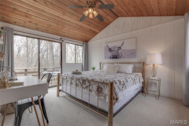 628 W St Gallen Dr, Innsbrook, MO 63390 - carpeted bedroom with vaulted ceiling, access to exterior, wood ceiling, wooden walls, and ceiling fan